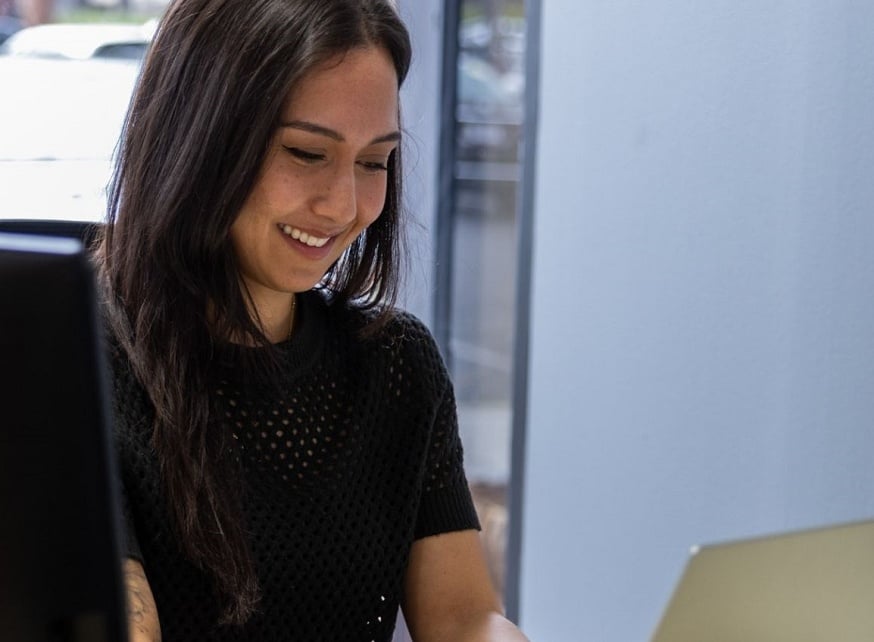Woman looking at laptop screen Woman looking at laptop screen