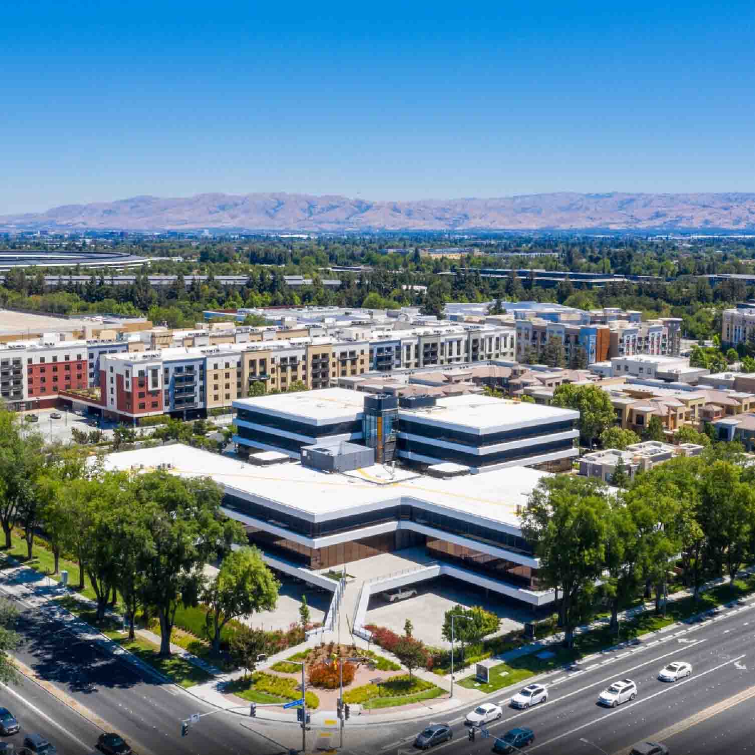 Aerial photo of building at 10080 N Wolfe Road with Pacific Workplaces Cupertino