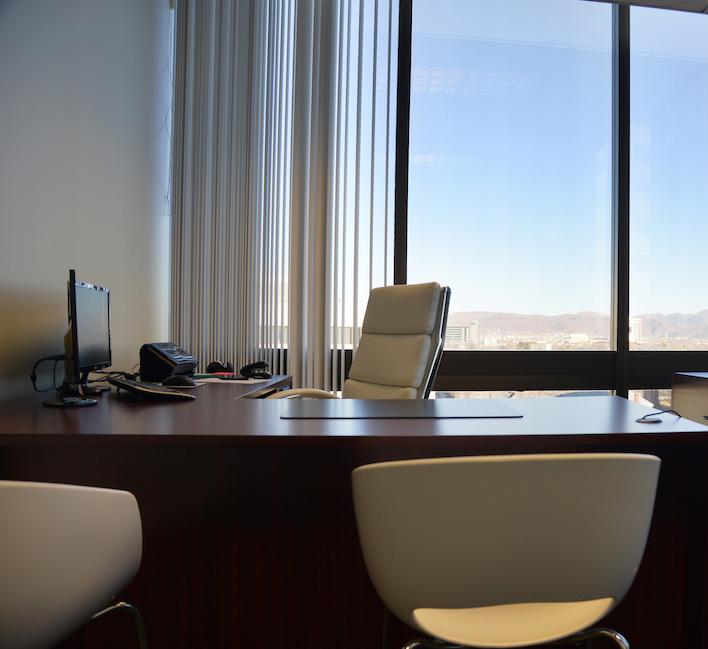Desk and chair in office in coworking space in Reno