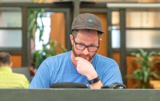 Man exploring virtual office plans at Nextspace Santa Cruz