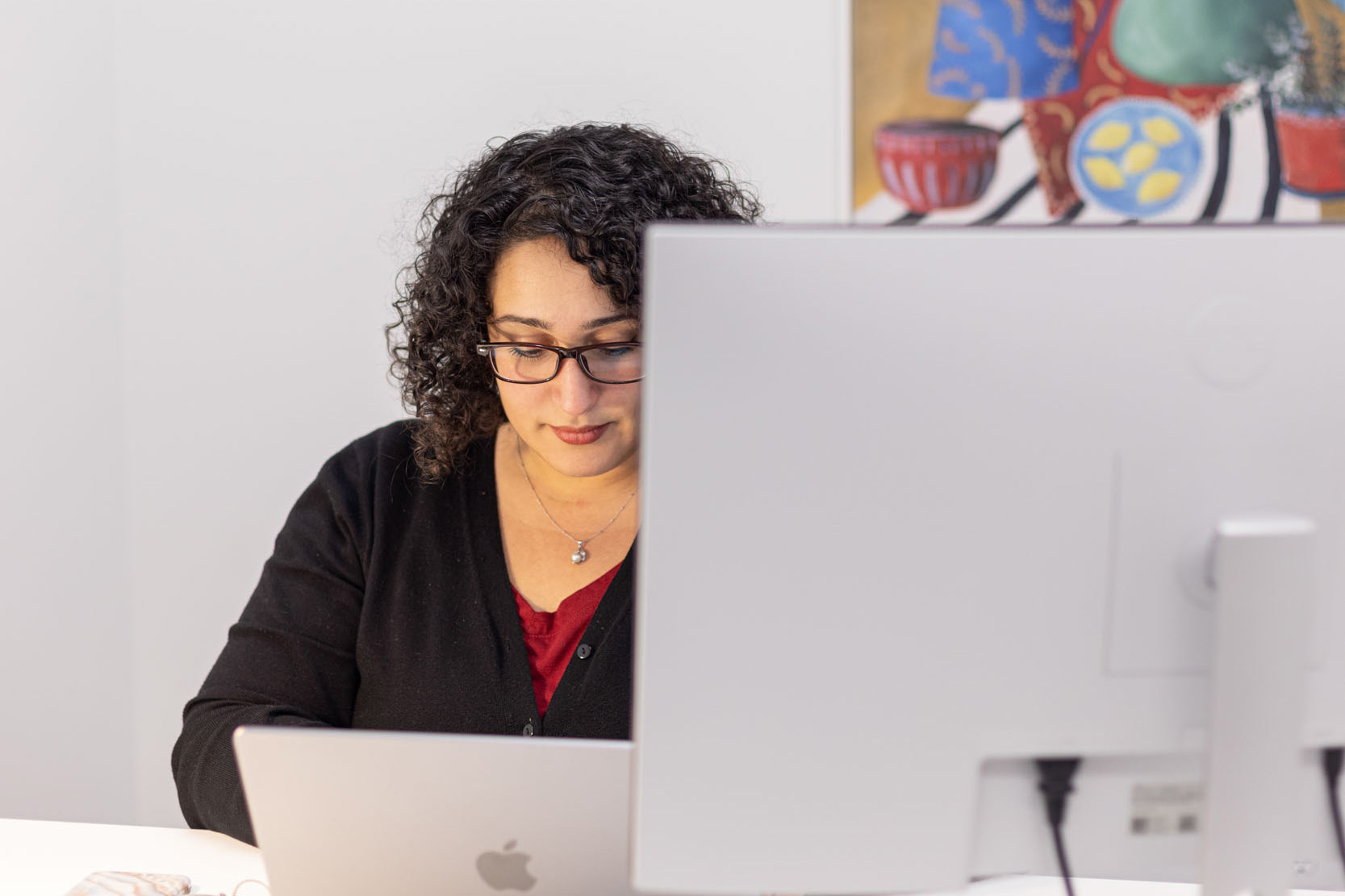 Woman searching for virtual office in Greenhaven on laptop Woman searching for virtual office in Greenhaven on laptop