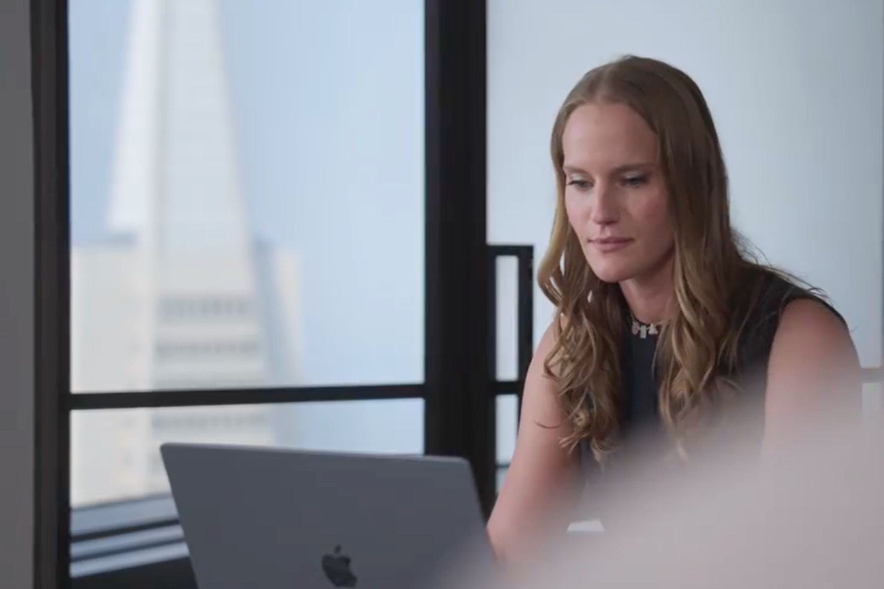 woman working at San Francisco office space Financial District woman working at San Francisco office space Financial District